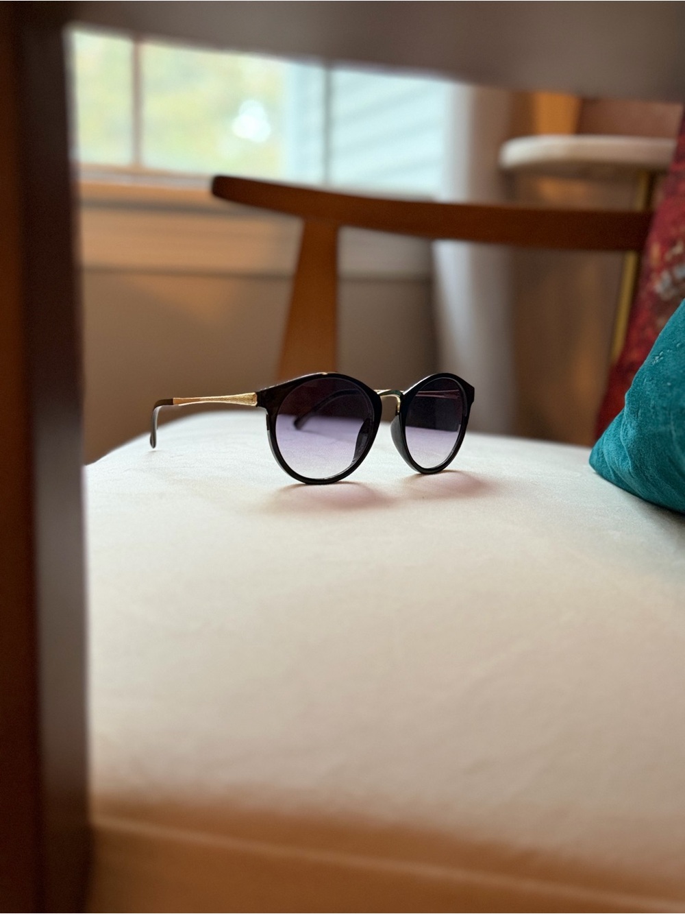 Women's Black Round Sunglasses with Gold Temples